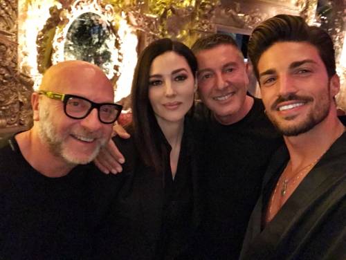 Bellucci e Di Vaio, icone di eleganza sulla passerella di Dolce & Gabbana