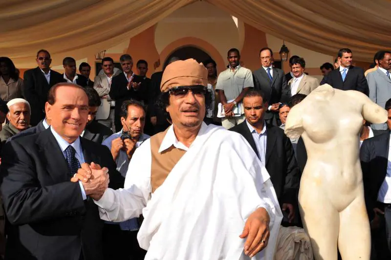Quest'anno all’incontro col Cav 
Gheddafi arriva con 30 cavalli