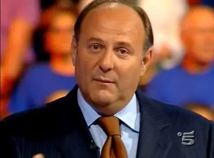 Gerry Scotti si commuove in diretta sulle note di Pino Daniele