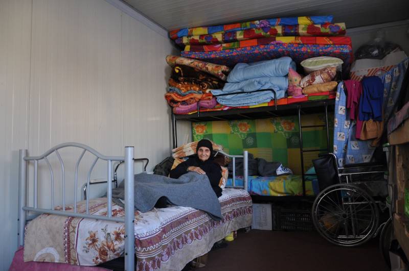 L'interno di un modulo abitativo per i rifugiati cristiani ad Erbil in Kurdistan 