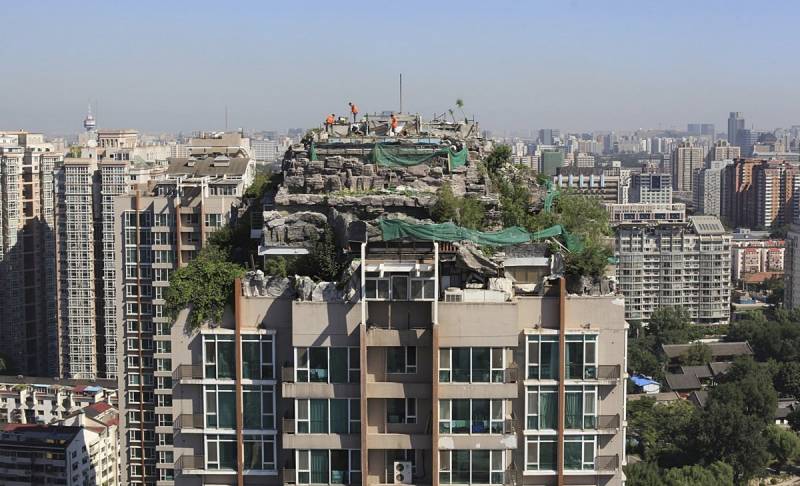 Demolizione della villa in rocce sul grattacielo, Pechino