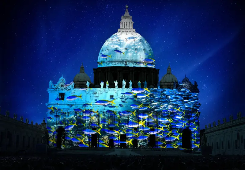 School of fish projected on St. Peter's Basilica. Photography by David Doubilet. Artistic rendering by Obscura Digital