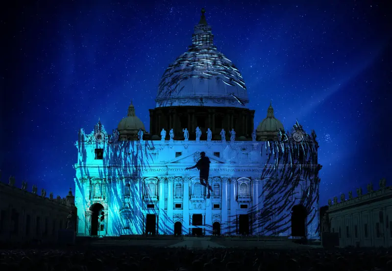 Fish and human projected on St. Peter's Basilica. Photography by David Doubilet. Artistic rendering by Obscura Digital
