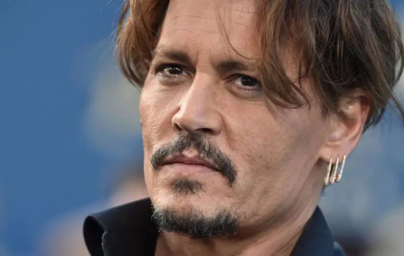 Johnny Depp denuncia Amber Heard per diffamazione