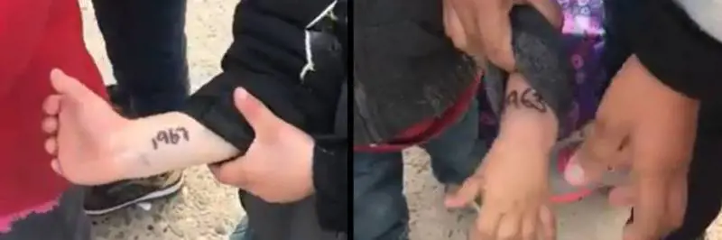 Messico, bimbi al confine mostrano numeri identificativi sul braccio