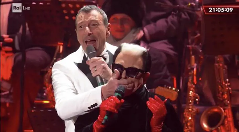 Cristiano Malgioglio vuole spoilerare Sanremo, Amadeus gli tappa la bocca