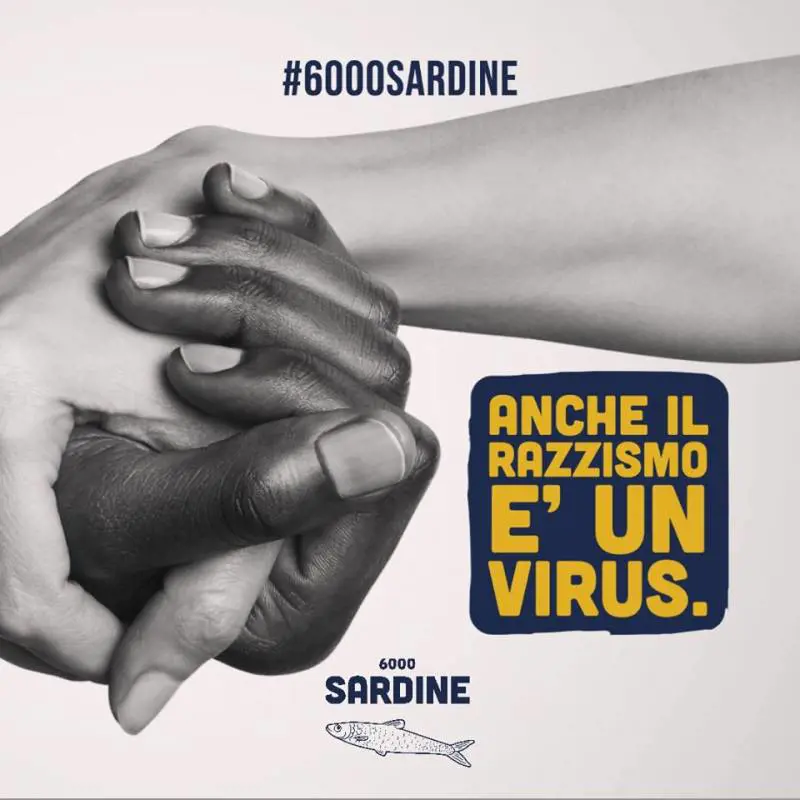Lo schiaffo delle sardine: "Anche il razzismo è un virus"