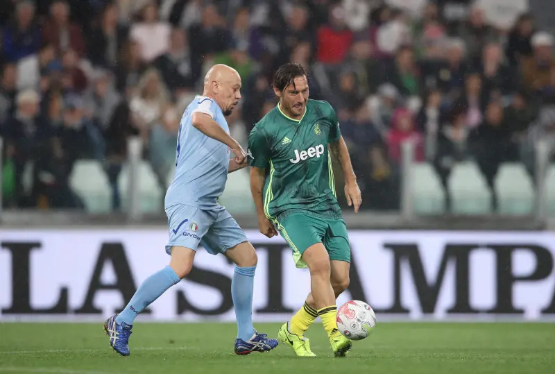 Partita del Cuore 2019 azione Totti Ruggeri