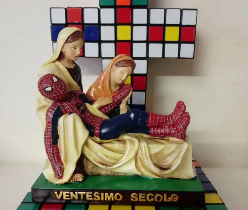 La mostra "blasfema" esposta in chiesa: l'ultima provocazione del prete no global