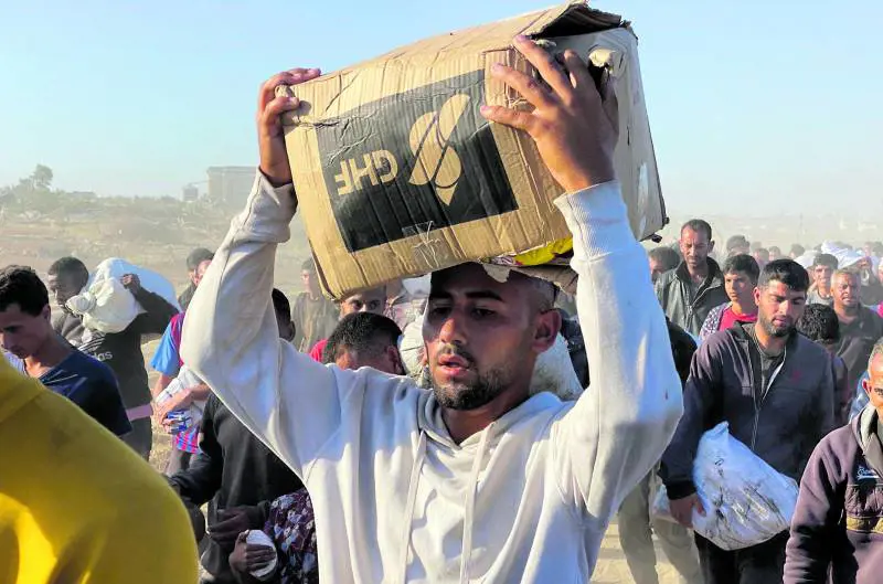 Aiuti, spari sulla folla. L'Idf smentisce