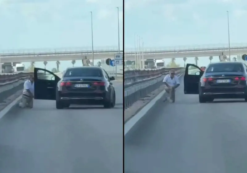 Commando armato blocca auto in strada: uomo rapinato e in ginocchio, le immagini choc