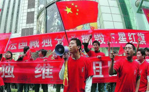 Sarkozy tenta la via 
della pace con Pechino