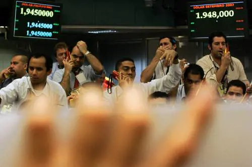 Bush: "Un salvagente 
anche per banche estere"