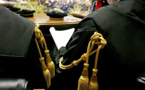 Caso Mills, il lodo alla Consulta 
Ma il tribunale: "Avanti lo stesso"