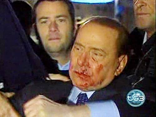 Berlusconi aggredito: dietro la violenza c'è una regia