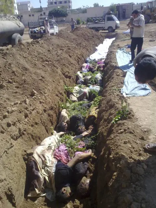 Siria, trovati oltre 400 cadaveri nelle fosse comuni. Assad non cede