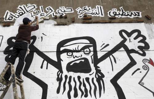 Egitto, graffiti contro Morsi