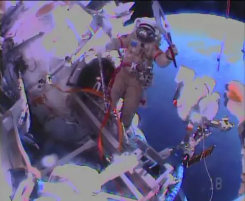 Passeggiata spaziale  per la fiamma olimpica