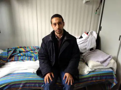 Il deputato del Pd Khalid Chaouki all'interno del centro d'accoglienza di Lampedusa