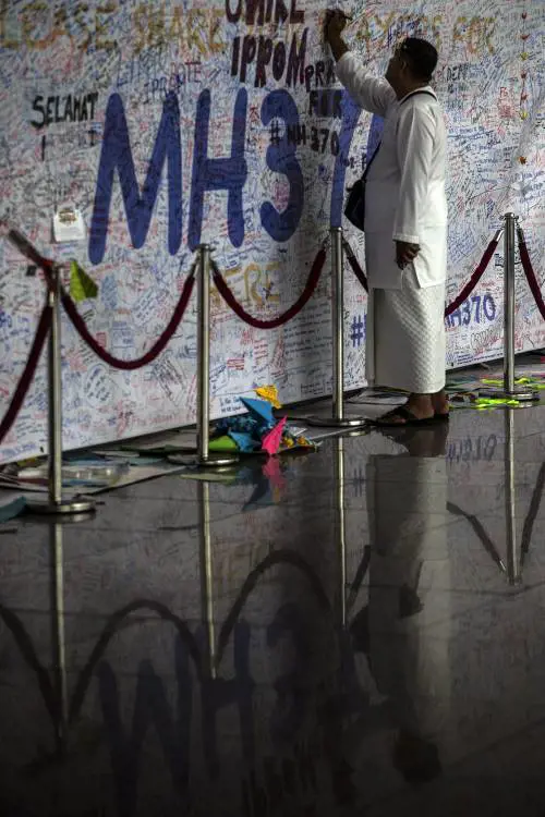 Il "muro della speranza" all'aeroporto di Kuala Lumpur
