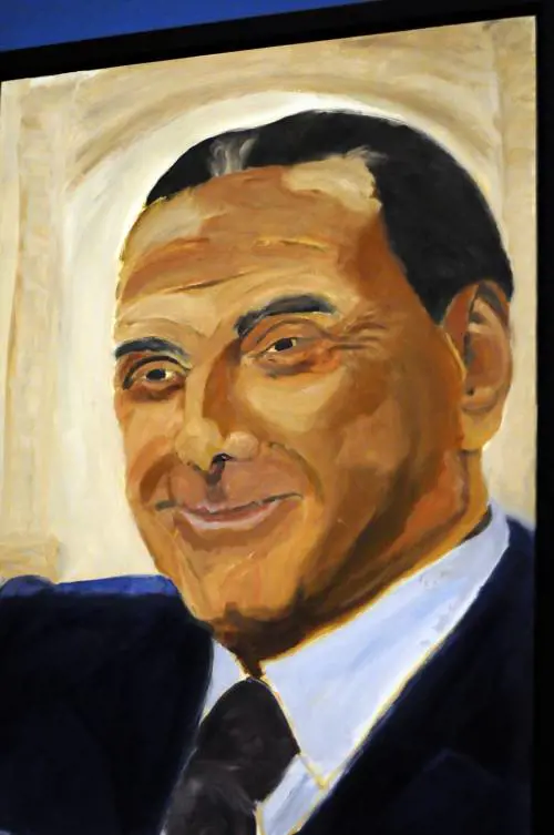 Prima mostra di quadri di G. Bush. C'è anche Berlusconi