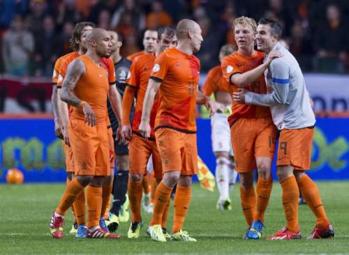 I giocatori olandesi festeggiano il primato nel girone