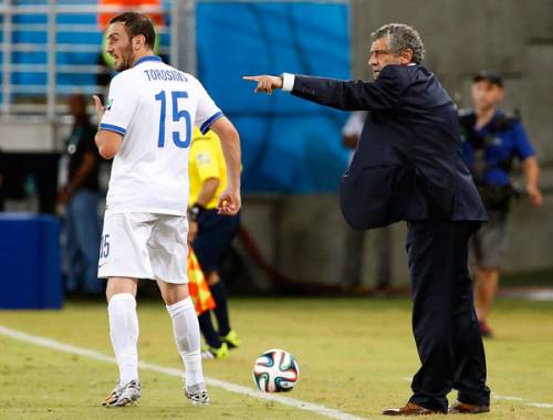Torosidis con l'allenatore portoghese Santos
