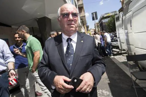 Carlo Tavecchio esce dalla sede romana della Figc