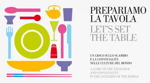 I bambini giocano con le tavole e i cibi del mondo