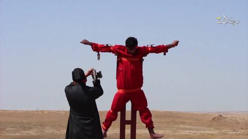 Crocifisso e amputato dall'Isis