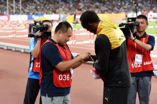 La stretta di mano tra Bolt e Tao