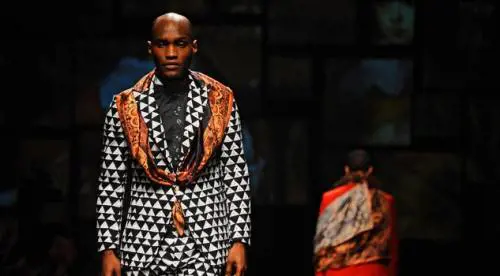 A Pitti Uomo la sfilata di moda con i profughi in passerella