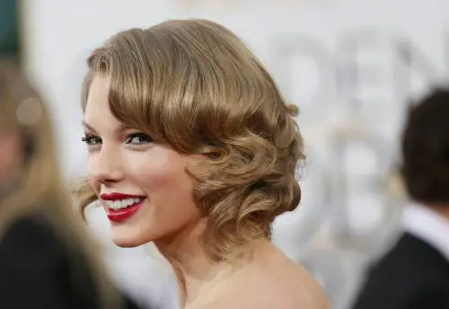 Taylor Swift VS Kim Kardashian: le foto