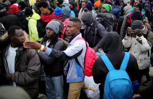 I buoni Coop rivenduti in nero: svelato il business dei migranti