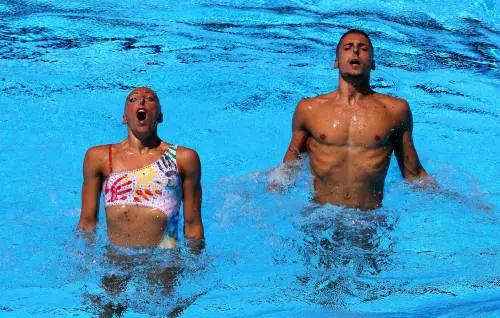 Oro nel sincro, le foto più belle di Flamini e Minisini