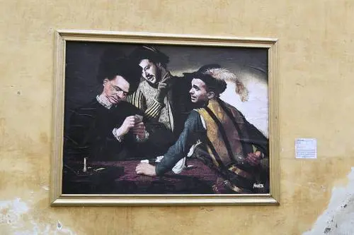 Berlusconi, Salvini e Di Maio come ne "I Bari" di Caravaggio