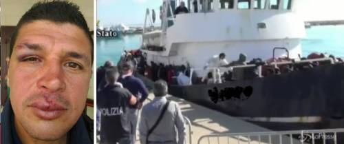 Migranti prendono a testate due agenti. Foto choc: l'ira della polizia 
