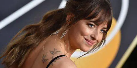 Dakota Johnson su Chris Martin: “Sono davvero felice”