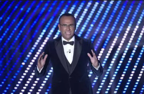 Carlo Conti dice no a Tale e Quale Kids: "I bambini devono fare i bambini"