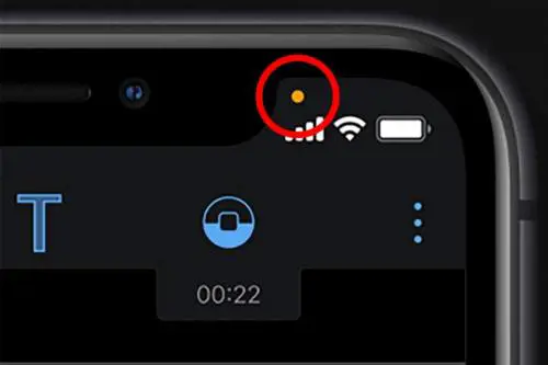 Attenti al pallino arancione iPhone: cosa vuol dire