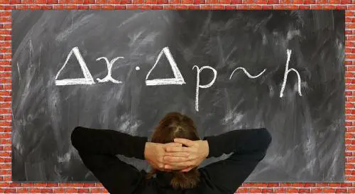 Le particelle non hanno un "posto". Ci sono solo onde di probabilità