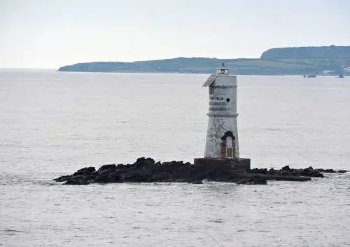 Faro Mangiabarche: storia e leggende dalla Sardegna