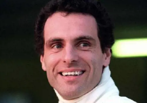 Roland sorridente ai box 
