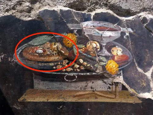 Pompei, scoperta un'antenata della "pizza" in un'affresco di 2000 anni fa