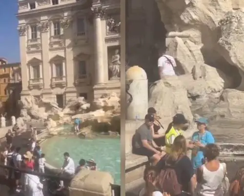 Si arrampica sulla Fontana di Trevi per riempire la bottiglia: ennesimo sfregio al patrimonio italiano