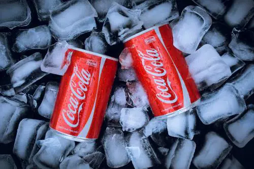 Nuova ricetta Coca Cola: ecco cosa cambia dopo la decisione di Trump