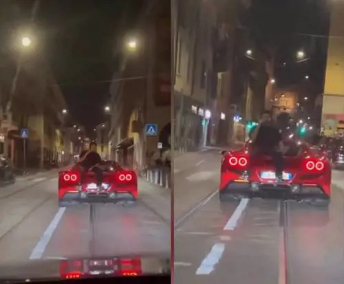 Ultima follia a Milano: al cellulare seduto su una Ferrari