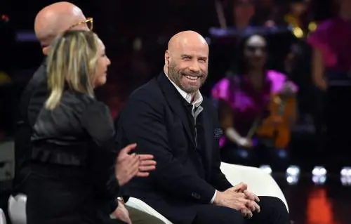 Sanremo, John Travolta ospite delle seconda serata. E Amadeus va da Fazio