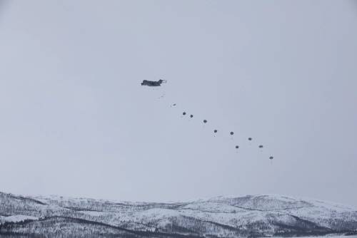 U.S. Army Soldiers with 1st Battalion, 501st Parachute Infantry Regiment, 2nd Infantry Brigade Combat Team (Airborne), 11th Airborne Division, jump from a C-17 Globemaster III onto Lake Takvatnet during Arctic Shock 24 near Bardufoss, Norway, March 18, 20