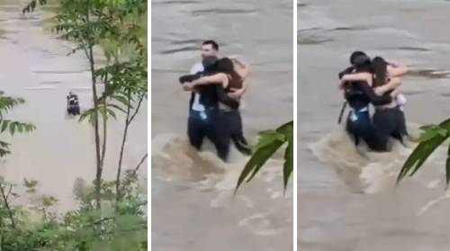 L'abbraccio e il fiume in piena. Tre dispersi per il maltempo in Friuli | Video